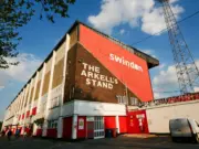 Outside shot of Swindon FC ground including Arkells stand and tower