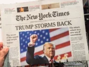 Donald Trump New York Times front page. Headline is 'Trump storms back' and picture shows him with his fist in the air